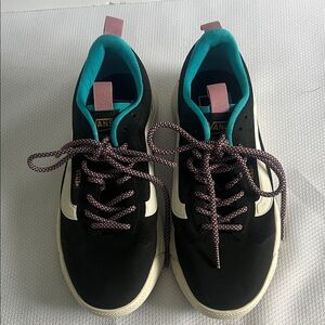 Vans Women's Off the Wall Black and White Sneakers with Teal Accents. Size 6.5